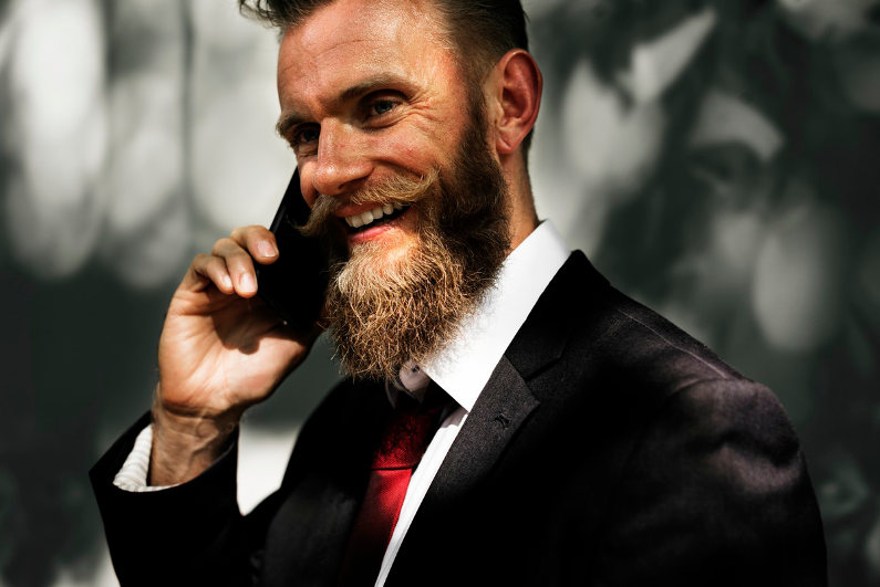 Businessman making a call to a client